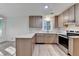 Bright and airy kitchen features modern appliances and ample cabinet storage at 315 N Fayette Dr, Fayetteville, GA 30214