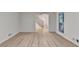 Bright living room with new floors, fresh paint, and view of the staircase at 315 N Fayette Dr, Fayetteville, GA 30214