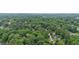 Expansive aerial view showcasing the neighborhood's mature trees and residential streets at 450 Collier Ridge Nw Dr, Atlanta, GA 30318
