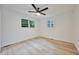 Bedroom features a modern ceiling fan and two windows providing great natural light at 450 Collier Ridge Nw Dr, Atlanta, GA 30318
