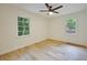 Bedroom features a modern ceiling fan and two windows providing great natural light at 450 Collier Ridge Nw Dr, Atlanta, GA 30318