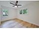 This bedroom features a modern ceiling fan and two windows providing great natural light at 450 Collier Ridge Nw Dr, Atlanta, GA 30318