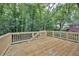 New wood deck overlooks a wooded area and provides an excellent space for outdoor living at 450 Collier Ridge Nw Dr, Atlanta, GA 30318