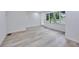 Lots of natural light fills this spacious living area with new flooring at 450 Collier Ridge Nw Dr, Atlanta, GA 30318