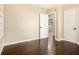 Bedroom with hardwood floors and a view into another room at 1207 Ellington Dr, Morrow, GA 30260