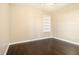 Bedroom with hardwood floors and built in shelving at 1207 Ellington Dr, Morrow, GA 30260