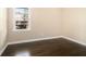 Bedroom with hardwood floors, window view, and neutral walls at 1207 Ellington Dr, Morrow, GA 30260