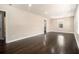 Spacious living room with hardwood floors, neutral walls, and recessed lighting at 1207 Ellington Dr, Morrow, GA 30260