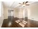 Living room with hardwood flooring, paneled walls, and coffered ceilings at 1207 Ellington Dr, Morrow, GA 30260