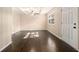 Inviting living room with coffered ceiling, hardwood floors, and natural light at 1207 Ellington Dr, Morrow, GA 30260