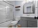 Modern bathroom featuring a glass-enclosed shower and a vanity with a sink at 4255 Hidden Meadow Circle, Sugar Hill, GA 30518