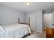 Bright bedroom with soft carpet, fresh paint, closet, and natural light at 4255 Hidden Meadow Circle, Sugar Hill, GA 30518