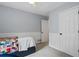Comfortable bedroom with a closet and carpet flooring at 4255 Hidden Meadow Circle, Sugar Hill, GA 30518