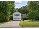 Charming two-story home with a well-manicured lawn, attached two car garage, and lovely landscaping at 4255 Hidden Meadow Circle, Sugar Hill, GA 30518