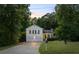 Charming two-story home with a well-manicured lawn, attached two car garage, and lovely landscaping at 4255 Hidden Meadow Circle, Sugar Hill, GA 30518