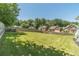 Large, well-maintained backyard with green grass and privacy fence, perfect for outdoor activities and relaxation at 4610 Admiral Ridge Way, Lilburn, GA 30047