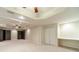 Finished basement features built-in desk, bookshelves, carpeting, and neutral walls at 4610 Admiral Ridge Way, Lilburn, GA 30047