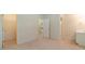 Bedroom with carpet, and connected to a bathroom and a walk-in closet at 4610 Admiral Ridge Way, Lilburn, GA 30047