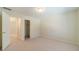 Neutral bedroom with carpet and an open closet and doorway at 4610 Admiral Ridge Way, Lilburn, GA 30047