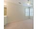 Bedroom with carpet, and a ceiling fan, featuring natural light from the windows at 4610 Admiral Ridge Way, Lilburn, GA 30047