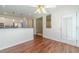 Light-filled dining room offers hardwood floors and access to the kitchen area at 4610 Admiral Ridge Way, Lilburn, GA 30047