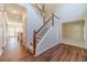 Open foyer with hardwood floors and staircase leading to the upper level at 4610 Admiral Ridge Way, Lilburn, GA 30047