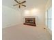 Cozy living room boasts a brick fireplace, perfect for relaxing evenings at 4610 Admiral Ridge Way, Lilburn, GA 30047