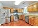 Modern kitchen with stainless steel appliances and plenty of cabinet space at 744 Martin Rd, Stone Mountain, GA 30088