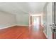 Inviting living room featuring gleaming hardwood floors and neutral wall colors at 744 Martin Rd, Stone Mountain, GA 30088