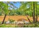 Scenic view of a tranquil lake framed by lush greenery, showcasing the serene setting at 744 Martin Rd, Stone Mountain, GA 30088