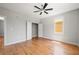 Bright bedroom featuring hardwood floors and a closet at 110 Hogue St, Atlanta, GA 30312