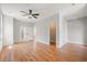 Spacious bedroom with hardwood floors, ceiling fan, and ample natural light at 110 Hogue St, Atlanta, GA 30312