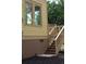 Exterior view of a two story home showcasing the stairs and window reflection at 110 Hogue St, Atlanta, GA 30312