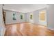 Bright living room featuring beautiful hardwood floors, large windows, and neutral paint, perfect for relaxation at 110 Hogue St, Atlanta, GA 30312