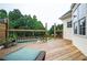 Inviting wooden deck with wood and metal railings offers views of the backyard and provides space for outdoor living at 409 Cold Springs Ln, Mcdonough, GA 30252