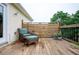 Relax on your back porch with wicker chairs and privacy fence at 409 Cold Springs Ln, Mcdonough, GA 30252