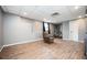 Finished basement features durable flooring and access to other rooms at 409 Cold Springs Ln, Mcdonough, GA 30252