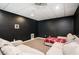 The finished basement boasts plush carpeting and a cozy seating area at 409 Cold Springs Ln, Mcdonough, GA 30252