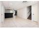 Basement featuring tile flooring, recessed lighting, and stairs leading to the upper level at 409 Cold Springs Ln, Mcdonough, GA 30252
