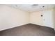 Finished basement features neutral walls and floors with a simple design at 409 Cold Springs Ln, Mcdonough, GA 30252