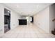 Basement features tile flooring, recessed lighting, wet bar, and access to an upper floor at 409 Cold Springs Ln, Mcdonough, GA 30252
