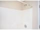 This bathroom has a white shower and brushed silver fixtures at 409 Cold Springs Ln, Mcdonough, GA 30252