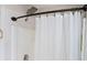 Modern bathroom shower with a rainfall shower head and white subway tile at 409 Cold Springs Ln, Mcdonough, GA 30252