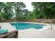 Swimming pool with patio and pool furniture, providing a relaxing space to enjoy the outdoors at 409 Cold Springs Ln, Mcdonough, GA 30252