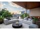 Spacious outdoor patio with comfortable seating, offering skyline views and an inviting entertainment space at 775 Juniper St # 405, Atlanta, GA 30308