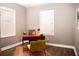 Cozy home office with natural light, warm tones and wood laminate flooring at 836 Wood Nw St, Atlanta, GA 30318