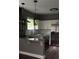 Modern kitchen featuring stainless steel appliances, granite counters, and pendant lights at 836 Wood Nw St, Atlanta, GA 30318