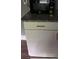 Modern kitchen cabinet features granite countertop, microwave and sleek hardware at 836 Wood Nw St, Atlanta, GA 30318