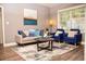 Bright living room with stylish furniture, a rug, and a window overlooking the outdoors at 836 Wood Nw St, Atlanta, GA 30318
