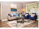 Cozy living room features modern decor, wood floors, and bright natural light at 836 Wood Nw St, Atlanta, GA 30318